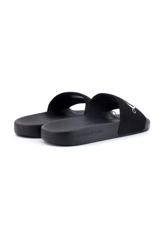 CALVIN KLEIN Ciabatta Uomo Slide Monogram Black YM0YM00061 - Sandrini Calzature e Abbigliamento
