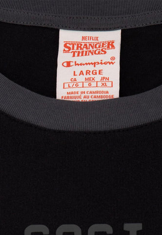 CHAMPION x STRANGER THINGS T-Shirt Hawkins 1983 Nero 217756 - Sandrini Calzature e Abbigliamento