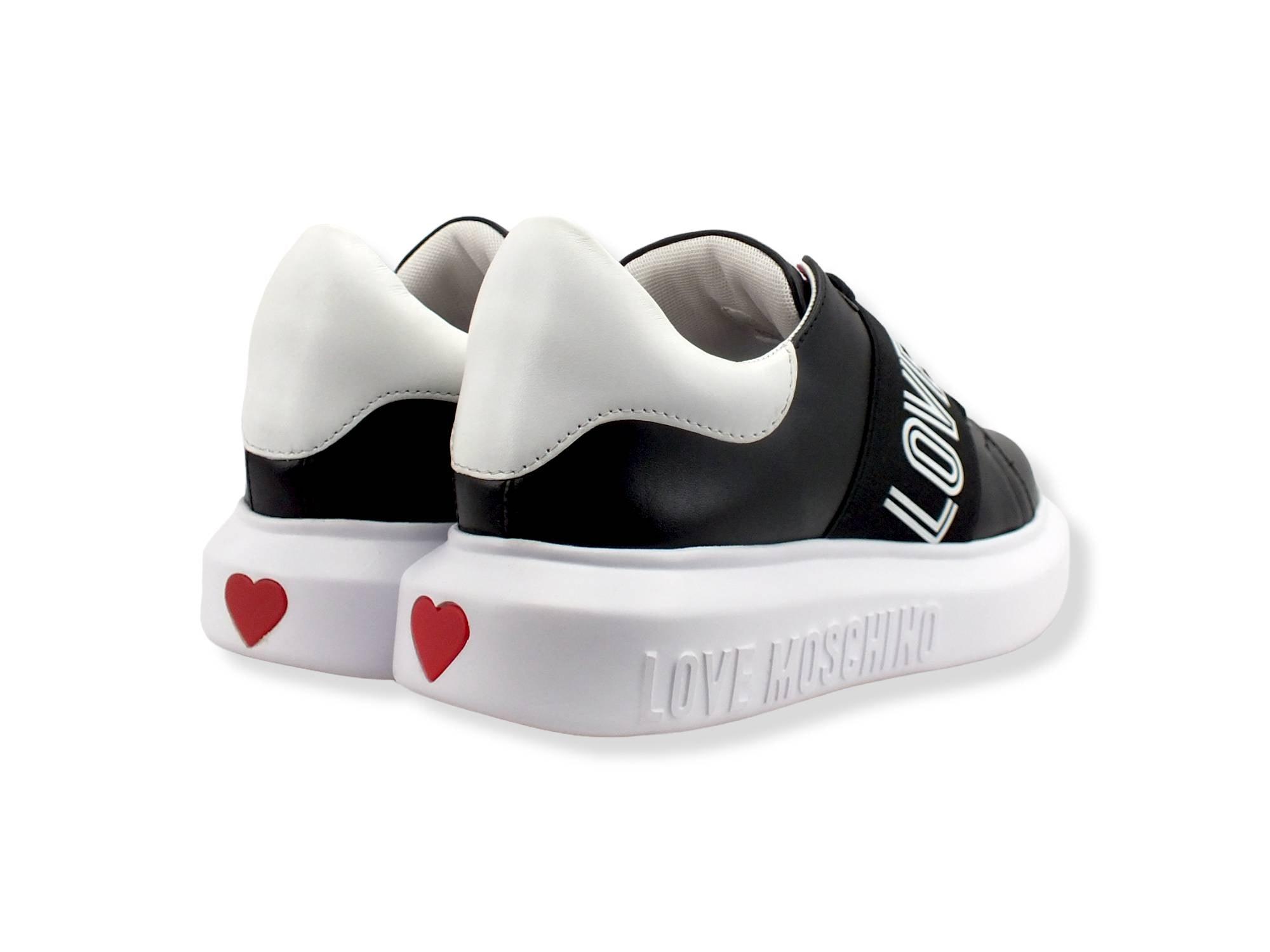 Love Moschino cup sole trainer with pink glitter heart in white Love Moschino cup sole trainer with pink glitter heart in white