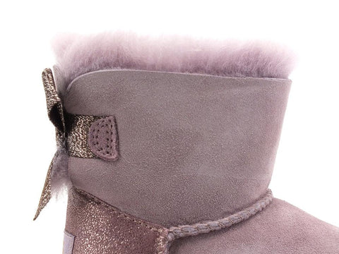 UGG K Mini Bailey Bow Glitz Stivaletto Pelo Shadow K1123617K - Sandrini Calzature e Abbigliamento